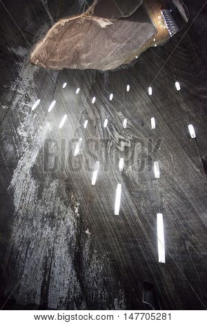 TURDA, ROMANIA - SEPTEMBER 15, 2016. Underground salt mine in Turda ,popular attraction for many tourists,Transylvania, Romania.