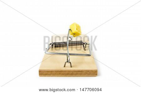 Mousetrap with cheese isolated on white background