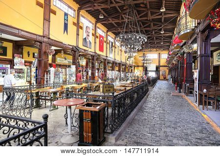 ESKISEHIR TURKEY - SEPTEMBER 03 2016: People have fun in Cafes and Restaurants in Haller Genclik Merkezi. Haller Genclik Merkezi was built as farmers market and converted to entertainment center.