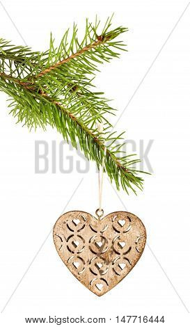 Vintage Christmas white heart decoration hanging on fir-tree branch isolated on white