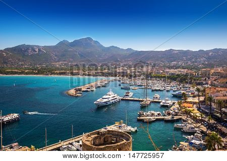 Calvi, Corsica - August 25, 2016 - View To Beautiful Corsica Coastline And Historic Hauses In Calvi