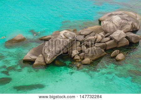 beautiful blue transparently sea waves stones view