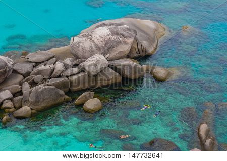 beautiful blue transparently sea waves stones view