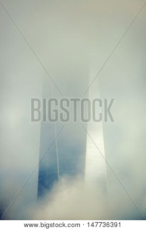 NEW YORK CITY - NOV 12: One World Trade Center in fog on November 12, 2014 in Manhattan, New York City. With population of 8.4M, it is the most populous city in the United States.