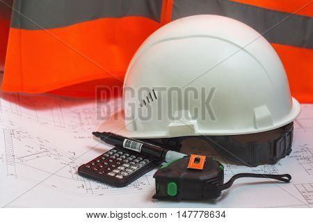 Accessories Engineer builder on a background of an orange vest and project solutions.