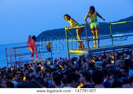 BUDVA- JULY 18 : CROWD IN FRONT OF THE DANCE PARADISO STAGE MORNING SESSION AT BEACH AT SEA DANCE FESTIVAL 2015 MUSIC FESTIVAL JULY 18 2015 IN BUDVA JAZ BEACH MONTENEGRO