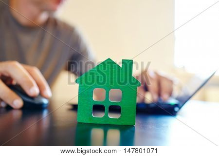 wooden house on the office table