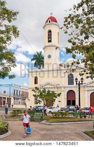CIENFUEGOS CUBA - February 05 2008. Cathedral Of The Immaculate Conception. Street life. Pupils walking home from school.