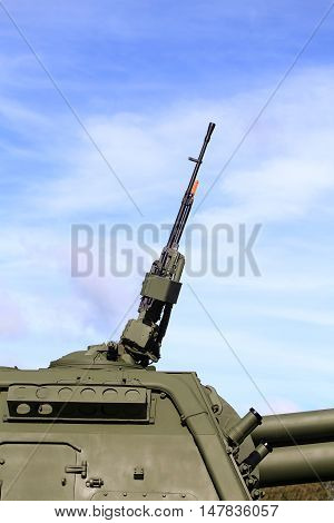 Rotating towerof the self-propelled gun consisting service of Russian army with 152 mm self-propelled howitzer and 127 millimeter anti-aircraft machine gun