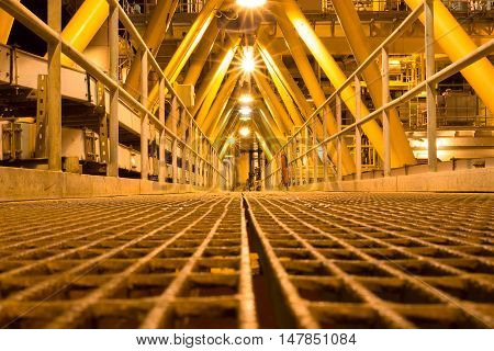Walkway or Bridge on offshore wellhead platform for oil and gas production process, Pipeline construction on walkway, Energy and petroleum industry
