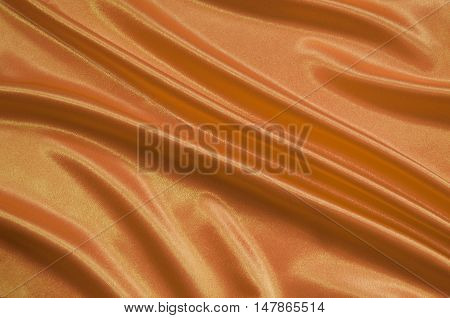 Texture of the satin fabric with folds