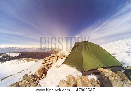 Camping on the top of the mountain in winter.