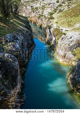 River Jucar With Green Waters Near Alarcon, Castilla La Mancha, Spain
