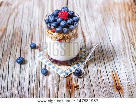Healthy Yogurt Parfait and Granola with Nuts and Berries. Healthy breakfast. Selective focus.