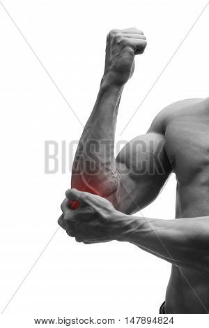 Pain in the elbow muscular male body isolated on white background with red dot black and white photography