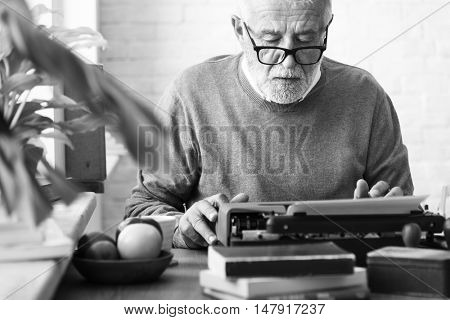 Senior Adult Typing Typerwriter Concept