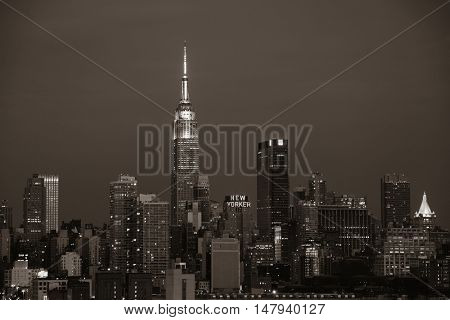 NEW YORK CITY - JUL 4: Empire State Building with skyscrapers on July 4, 2015 in Manhattan, New York City. With population of 8.4M, it is the most populous city in the United States.