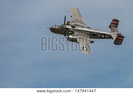 NEW WINDSOR NY - SEPTEMBER 03 2016: Panchito is a North American B-25 Mitchell from the Word War II Era flying over Stewart Airport at the New York Airshow