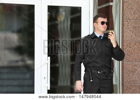 Male security guard outdoors