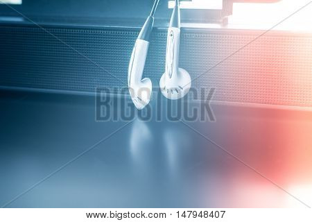 earpiece with speaker with color background .