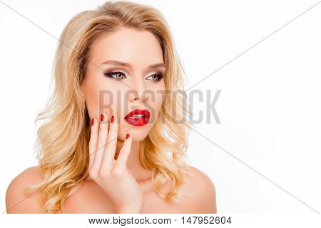 Portrait Of Pretty Young Blonde With Red Lips Touhing Face