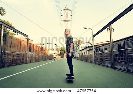 Young Girl Skateboard Outdoors Urban Concept