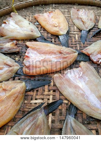 close up dry striped snakehead fish raw food