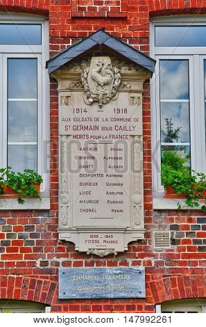 Saint Germain sous Cailly France - june 23 2016 : the war memorial on the city hall
