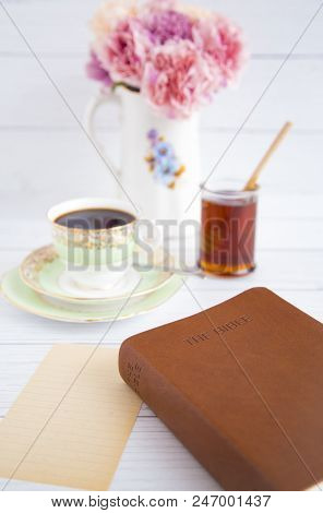 Morning Breakfast And A Bible Study On A White Table