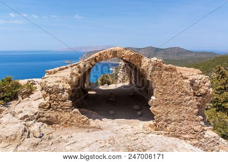 The Castle Of Monolithos On Rhodes Island. Sea View And Ruins Of A Small Chapel Built On Top Of Rock