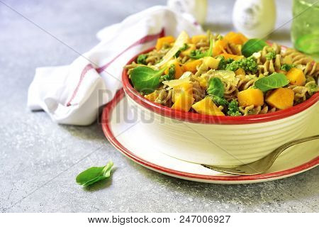 Whole Grain Fusilli Pasta With Pumpkin And Pesto Sauce.