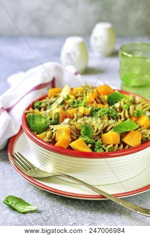 Whole Grain Fusilli Pasta With Pumpkin And Pesto Sauce.