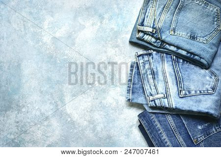 Variety Of Men And Woman Blue Jeans .top View With Copy Space.