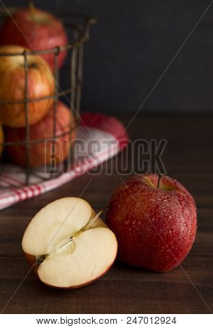 Beautiful Fresh Apples On A Wooden Table