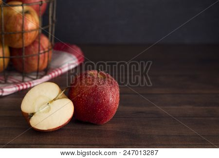 Beautiful Fresh Apples On A Wooden Table