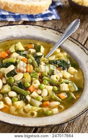 Fresh Homemade Vegetable Soup Made Of Zucchini, Celery, Carrot, Peas, White Beans, Green Beans, Pota