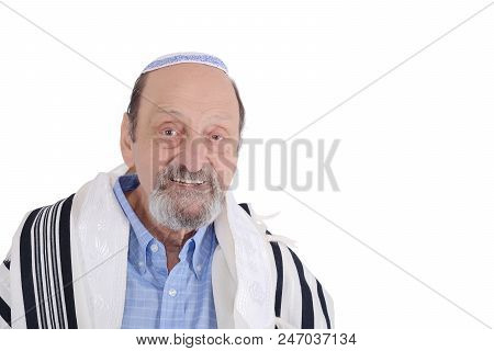 Eldery Jewish Man Wrapped In Talit Praying