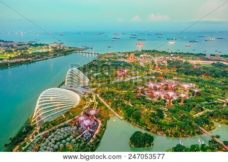 Aerial View Of Cityscape Singapore And Gardens By The Bay. Famous Tourist Attraction In Marina Bay A