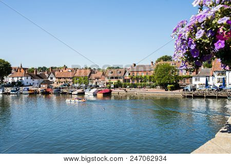 Skyline Of Henley On Thames In Oxfordshire Uk With River Thames In Foreground