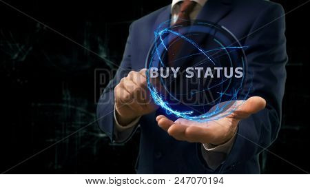 Businessman Shows Concept Hologram Buy Status On His Hand. Man In Business Suit With Future Technolo