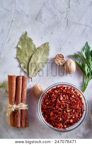 Culinary Still Life Of Assorted Spices On White Textured Background, Flat Lay, Close-up, Selective F