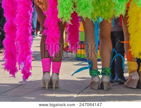 The Beautiful Legs Of Women Dancers Of The Pacific And Caribbean Beach