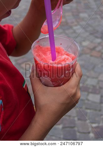 Granita To Take Away In A Plastic Cup With Pink Spoon And Lilac Drinking Straw
