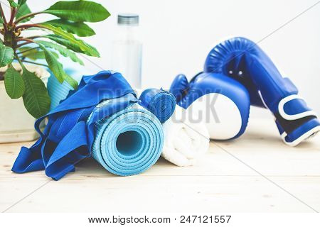 Set For Sports, A Yoga Mat, A Towel, Boxing Gloves And A Bottle Of Water On A Light Background. The 
