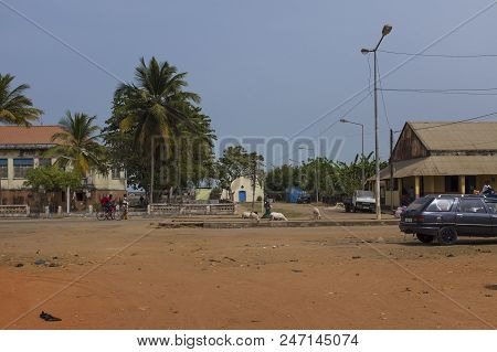 Cacheu, Republic Of Guinea-bissau - February 1, 2018: People In A Street Of The City Of Cacheu In Gu