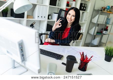 Portrait Of A Young Girl In A Suit. Beautiful Girl Is Working In The Office.