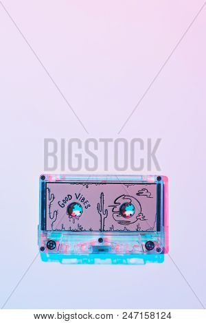 Top View Of Mixtape With Good Vibes Inscription On Purple Background