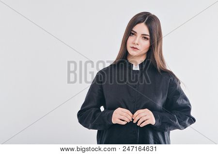 Cropped Photo: Close-up Of Clothing Items. Priest's Robe: Collar