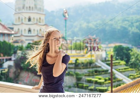 Young Woman Tourist In Buddhist Temple Kek Lok Si In Penang, Malaysia, Georgetown.