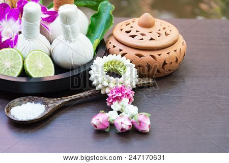 Spa Massage Compress Balls, Herbal Ball On The Wooden With Treaments Spa , Thailand, Select Focus